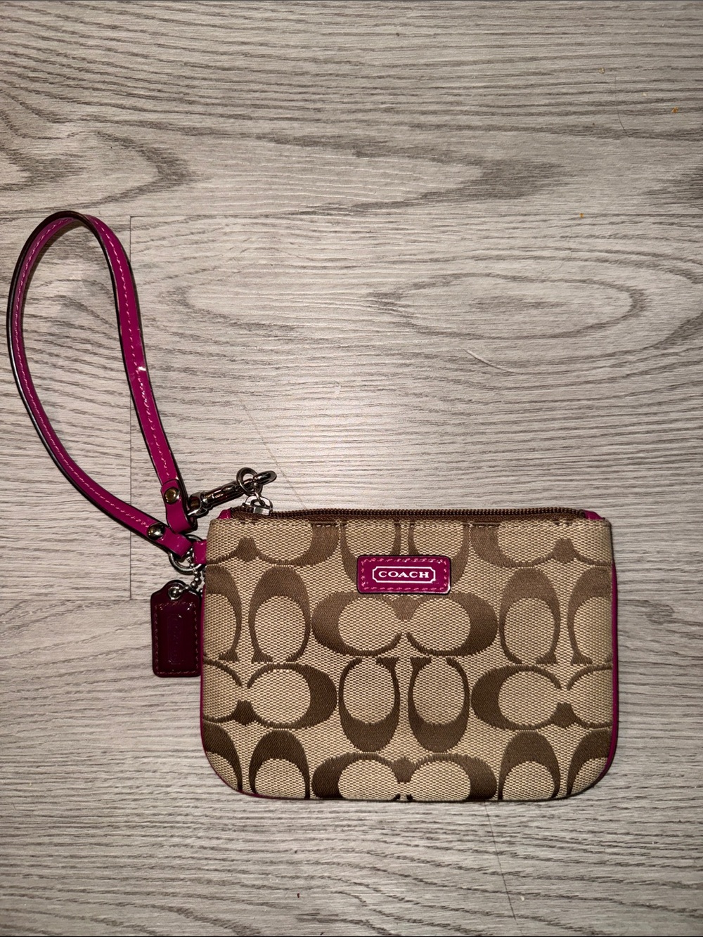Coach Tan Signature Canvas Wristlet with Fuscia Trim